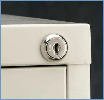 State Locksmith Services Dallas, TX 214-530-0311 - 12-unlocking-file-cabinet
